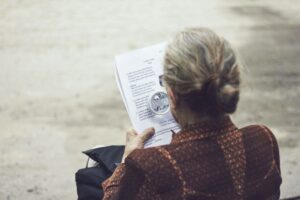 elderly woman reading 